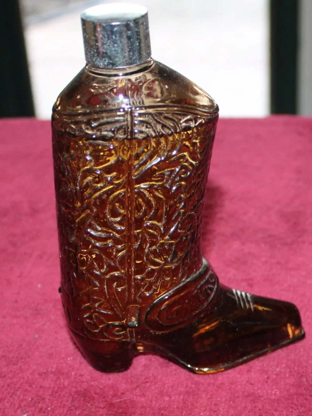 Vintage Avon Western Boot decanter featuring amber glass